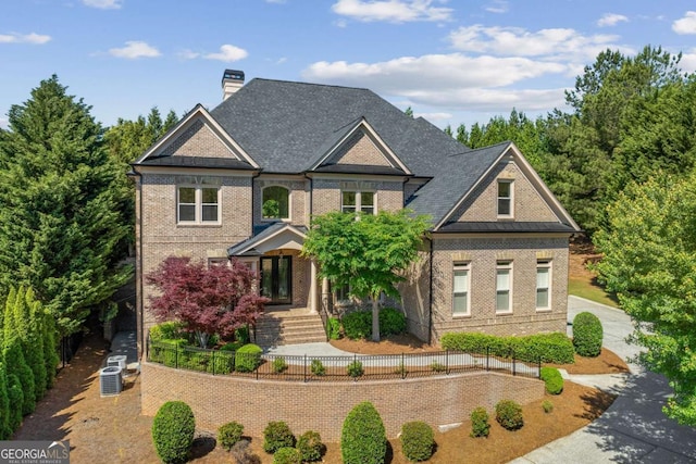 8745 Islesworth Ct, Duluth, GA 30097 - view of front of property with brick siding and a chimney