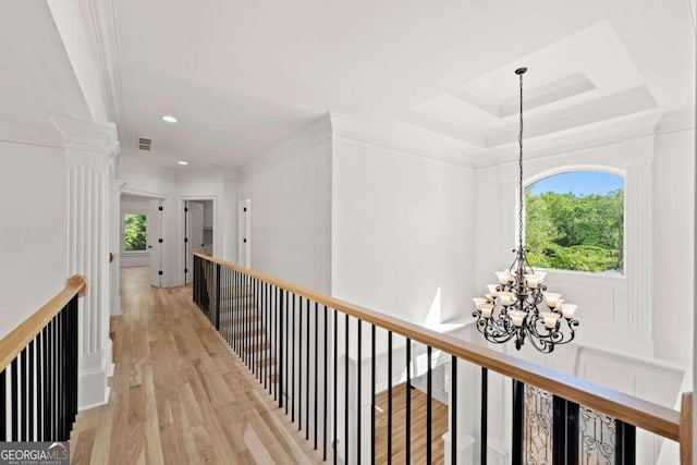 8745 Islesworth Ct, Duluth, GA 30097 - hall featuring a chandelier, crown molding, light wood finished floors, recessed lighting, and ornate columns