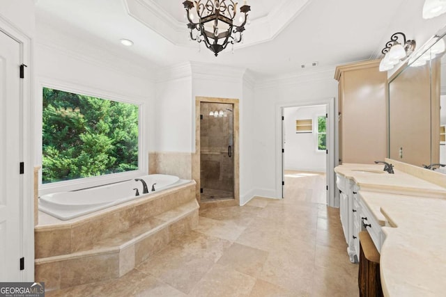 8745 Islesworth Ct, Duluth, GA 30097 - bathroom featuring a bath, vanity, a shower stall, crown molding, and a chandelier