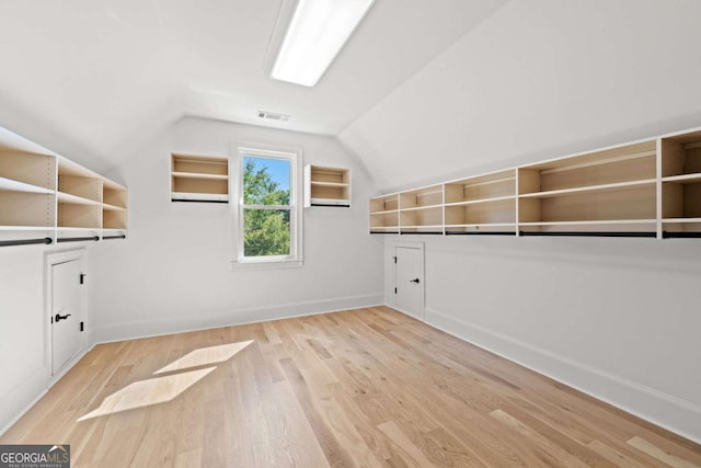 8745 Islesworth Ct, Duluth, GA 30097 - bonus room featuring wood finished floors and lofted ceiling