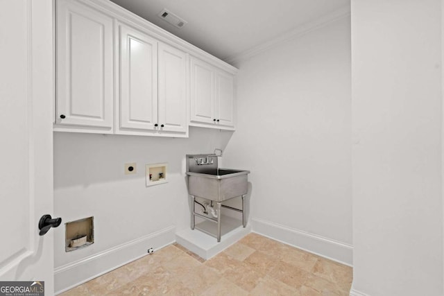 8745 Islesworth Ct, Duluth, GA 30097 - laundry room with cabinet space, electric dryer hookup, hookup for a washing machine, baseboards, and crown molding