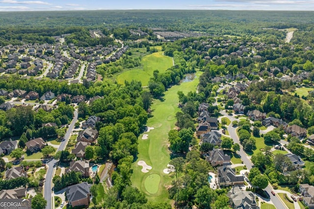 8745 Islesworth Ct, Duluth, GA 30097 - view of property location featuring nearby suburban area, a golf course, and a forest