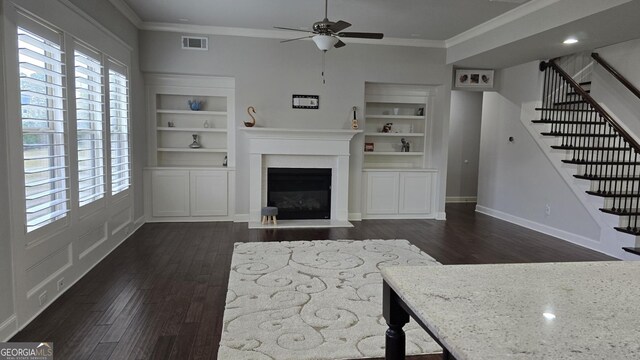 605 Lanshire Dr, Alpharetta, GA 30004 - living room with ornamental molding, a ceiling fan, dark wood-style floors, stairway, and baseboards