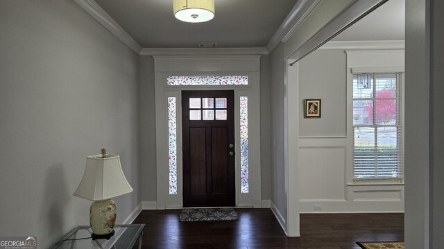 605 Lanshire Dr, Alpharetta, GA 30004 - entrance foyer featuring dark wood-type flooring, ornamental molding, and baseboards