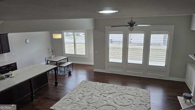 605 Lanshire Dr, Alpharetta, GA 30004 - living area featuring dark wood-style flooring, ceiling fan, and baseboards