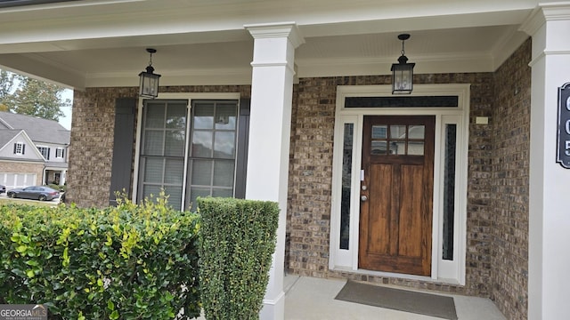 605 Lanshire Dr, Alpharetta, GA 30004 - view of exterior entry with brick siding and covered porch