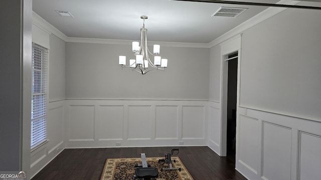 605 Lanshire Dr, Alpharetta, GA 30004 - unfurnished dining area with dark wood-style floors, a chandelier, a decorative wall, ornamental molding, and plenty of natural light