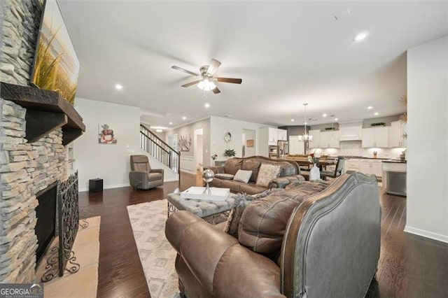 130 W Pier Way, Fayetteville, GA 30214 - living room featuring a ceiling fan, baseboards, recessed lighting, dark wood-style flooring, and a fireplace