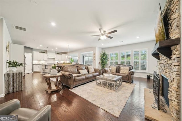 130 W Pier Way, Fayetteville, GA 30214 - living room featuring a ceiling fan, recessed lighting, dark wood-style flooring, a fireplace, and baseboards