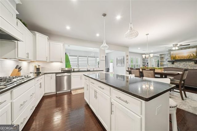 130 W Pier Way, Fayetteville, GA 30214 - kitchen featuring stainless steel appliances, recessed lighting, decorative backsplash, a ceiling fan, and a kitchen island