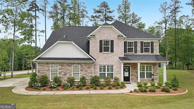 130 W Pier Way, Fayetteville, GA 30214 - craftsman-style house featuring board and batten siding, a front lawn, stone siding, and roof with shingles