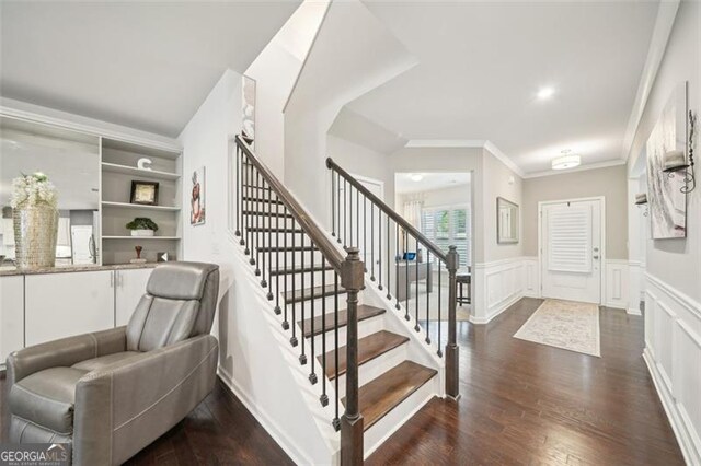 130 W Pier Way, Fayetteville, GA 30214 - entrance foyer with stairway, dark wood-style flooring, wainscoting, ornamental molding, and a decorative wall