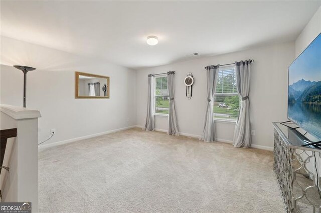 130 W Pier Way, Fayetteville, GA 30214 - unfurnished living room featuring carpet flooring