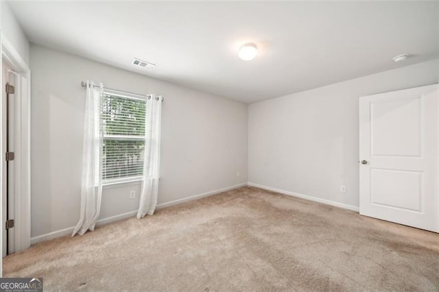130 W Pier Way, Fayetteville, GA 30214 - carpeted spare room with baseboards and a smoke detector
