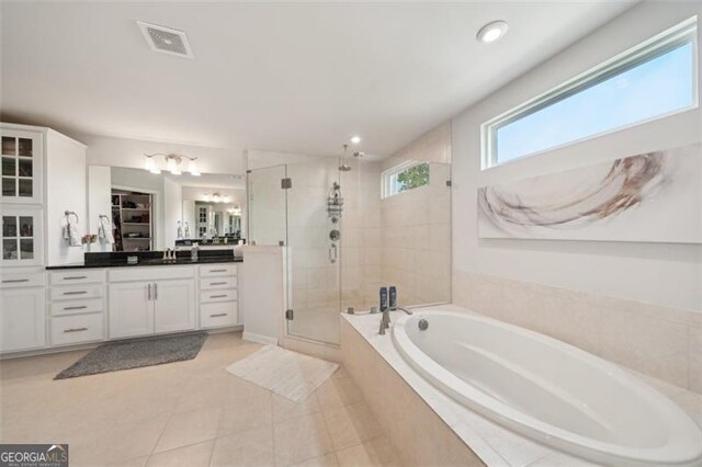 130 W Pier Way, Fayetteville, GA 30214 - bathroom featuring a stall shower, a bath, vanity, tile patterned floors, and recessed lighting