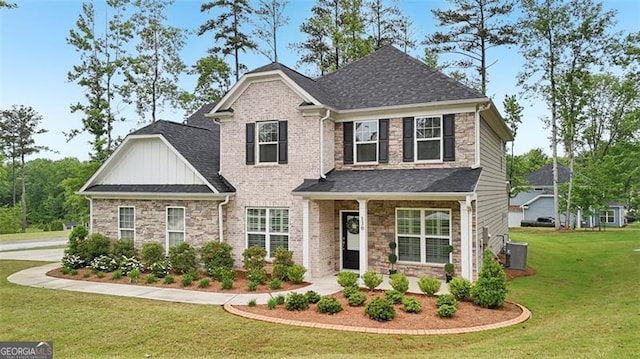 130 W Pier Way, Fayetteville, GA 30214 - craftsman inspired home featuring a front yard, stone siding, board and batten siding, roof with shingles, and central AC unit