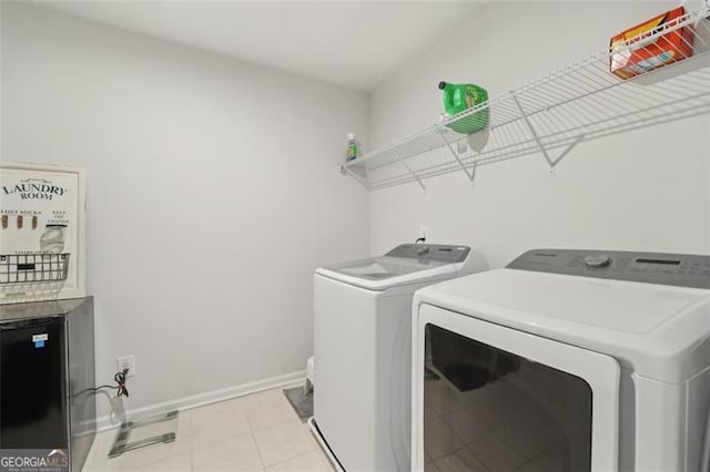 130 W Pier Way, Fayetteville, GA 30214 - clothes washing area with washing machine and clothes dryer and baseboards