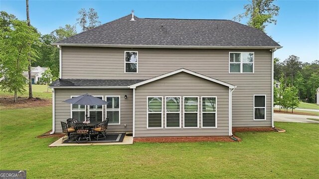 130 W Pier Way, Fayetteville, GA 30214 - back of property with a yard and a patio area