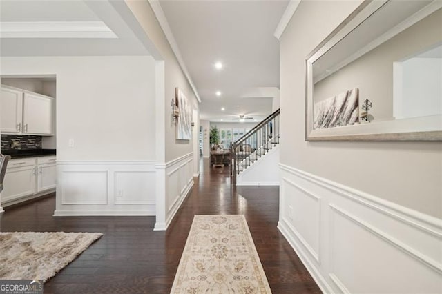 130 W Pier Way, Fayetteville, GA 30214 - corridor featuring stairs, a wainscoted wall, recessed lighting, dark wood-type flooring, and crown molding