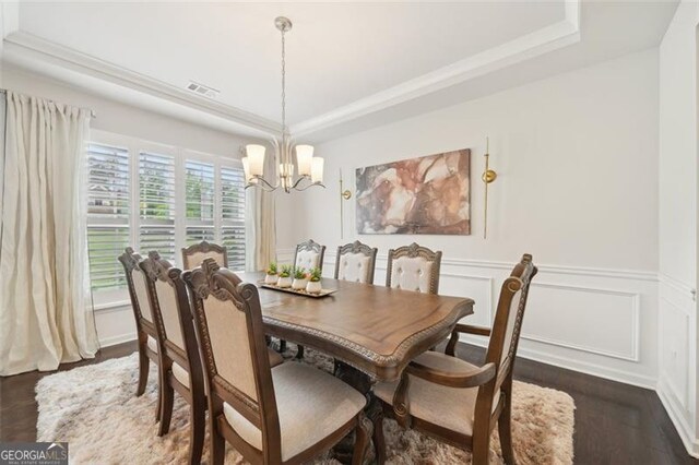 130 W Pier Way, Fayetteville, GA 30214 - dining space with a raised ceiling, a chandelier, and dark wood finished floors