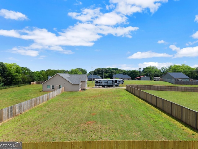 view of yard featuring fence