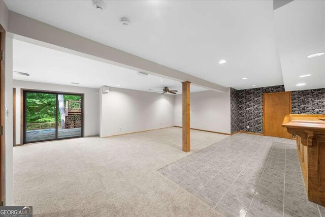 below grade area featuring recessed lighting and carpet