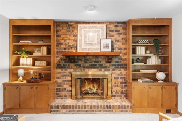 living area featuring a fireplace