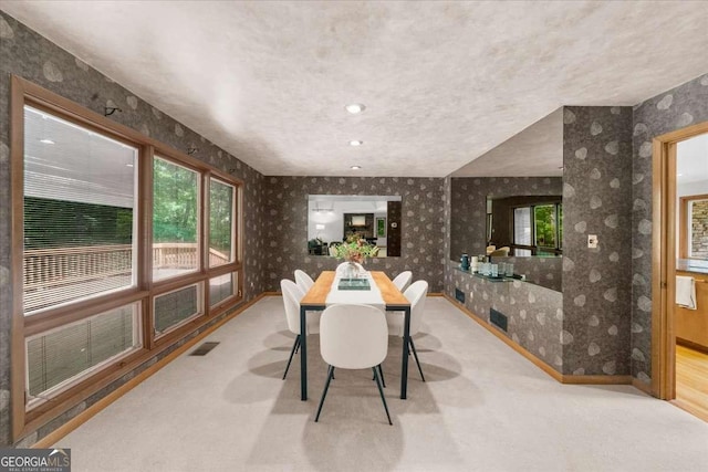 dining space featuring wallpapered walls, carpet, baseboards, and recessed lighting