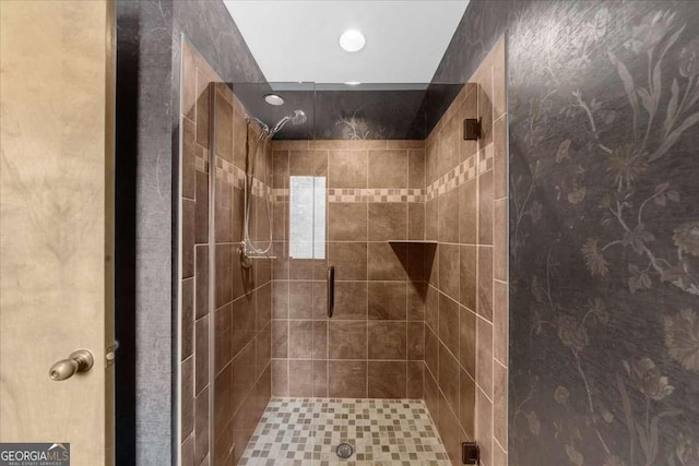 bathroom featuring a stall shower and recessed lighting