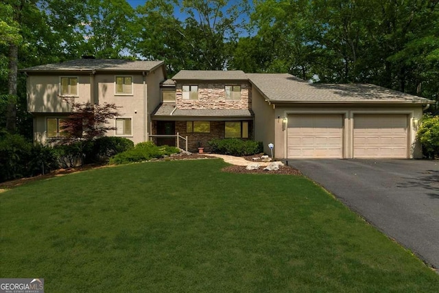 view of front of house with an attached garage, asphalt driveway, stucco siding, stone siding, and a front lawn