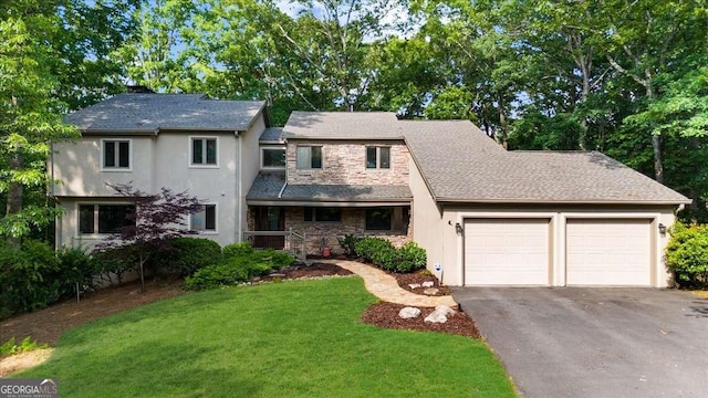 view of front of house with an attached garage, stucco siding, asphalt driveway, and stone siding