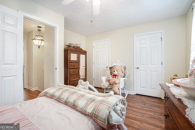 375 Buckwood Trl, Cornelia, GA 30531 - bedroom with dark wood-style flooring, baseboards, and a ceiling fan