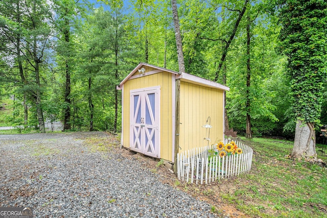375 Buckwood Trl, Cornelia, GA 30531 - view of shed featuring a wooded view