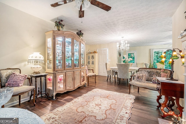 375 Buckwood Trl, Cornelia, GA 30531 - sitting room with a chandelier, a ceiling fan, dark wood-type flooring, and a textured ceiling