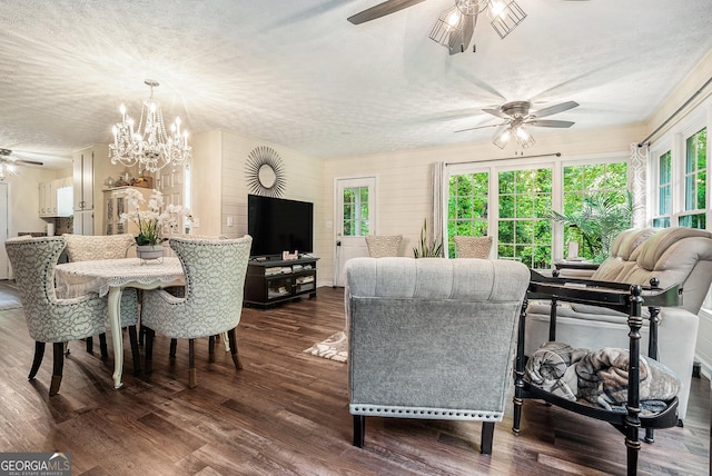 375 Buckwood Trl, Cornelia, GA 30531 - living room featuring ceiling fan, a textured ceiling, dark wood-style flooring, and a chandelier