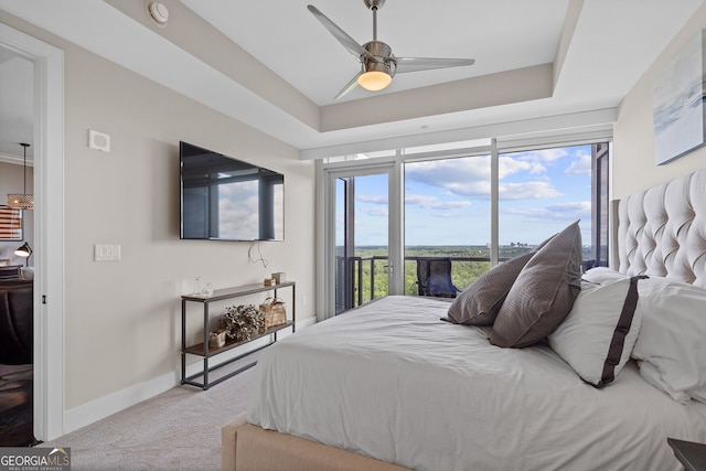 3630 Peachtree Rd NE Unit 1909, Atlanta, GA 30326 - bedroom featuring access to outside, carpet flooring, baseboards, a raised ceiling, and a ceiling fan