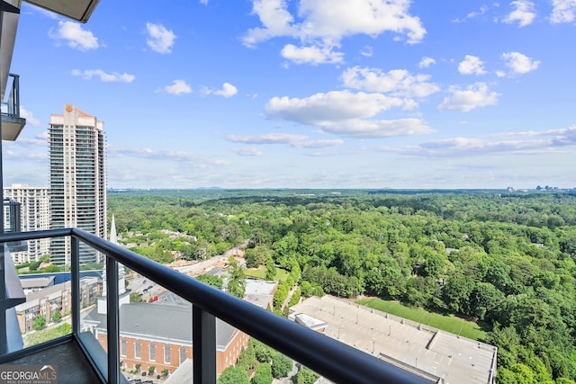 3630 Peachtree Rd NE Unit 1909, Atlanta, GA 30326 - balcony featuring a forest view