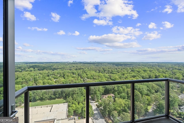 3630 Peachtree Rd NE Unit 1909, Atlanta, GA 30326 - balcony featuring a wooded view