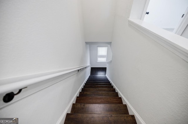 180 Oliver Dr, Locust Grove, GA 30248 - stairway with wood finished floors and baseboards