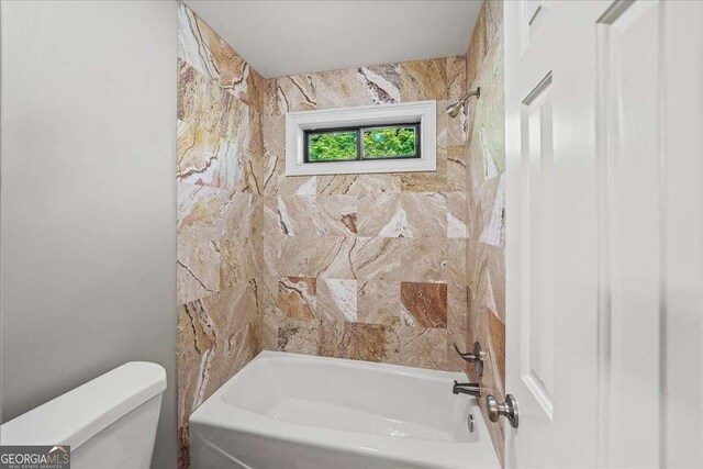 full bath with toilet and shower / tub combination