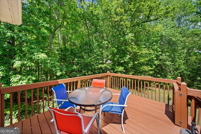 59 Kaiser Ct, Dallas, GA 30132 - wooden deck with outdoor dining area