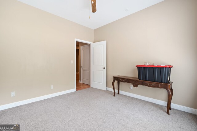 59 Kaiser Ct, Dallas, GA 30132 - carpeted spare room featuring baseboards and a ceiling fan