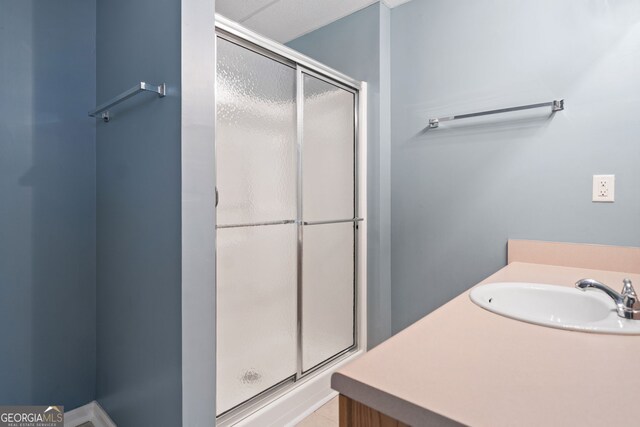 59 Kaiser Ct, Dallas, GA 30132 - full bath with a sink and a stall shower