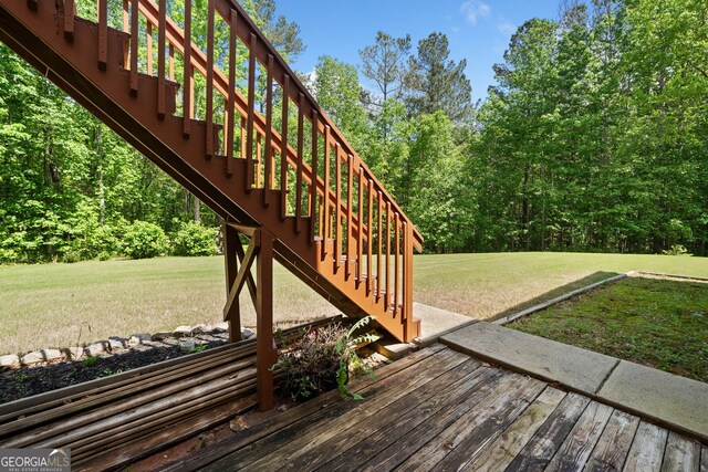 59 Kaiser Ct, Dallas, GA 30132 - deck featuring stairway and a yard