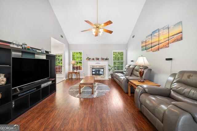 59 Kaiser Ct, Dallas, GA 30132 - living room featuring high vaulted ceiling, a ceiling fan, dark wood-type flooring, and a tiled fireplace
