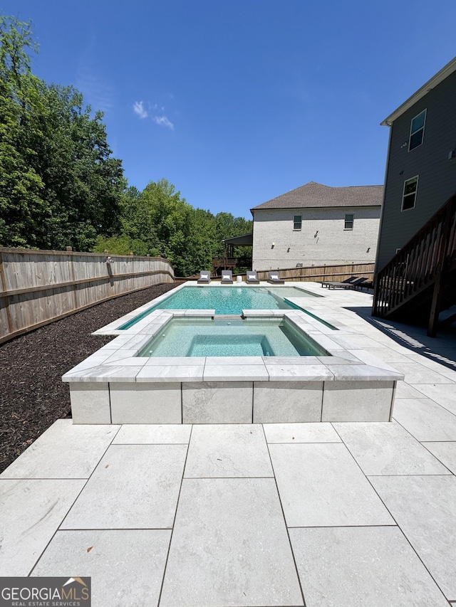 4736 Landing Water Path, Buford, GA 30519 - view of swimming pool featuring a fenced backyard, a patio, and an in-ground hot tub