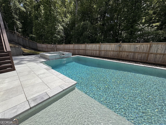 4736 Landing Water Path, Buford, GA 30519 - view of pool with a patio area, a fenced backyard, a pool with connected hot tub, and stairs