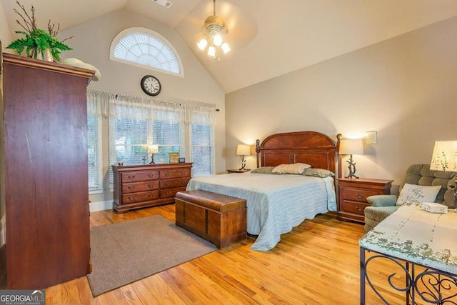 87 Marcus Ct, Ball Ground, GA 30107 - bedroom with high vaulted ceiling, light wood-style flooring, and a ceiling fan