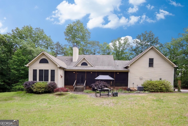 87 Marcus Ct, Ball Ground, GA 30107 - rear view of house featuring a sunroom, a yard, a chimney, and a gazebo