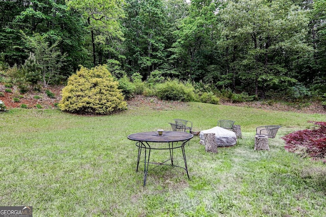 87 Marcus Ct, Ball Ground, GA 30107 - view of green lawn with a view of trees